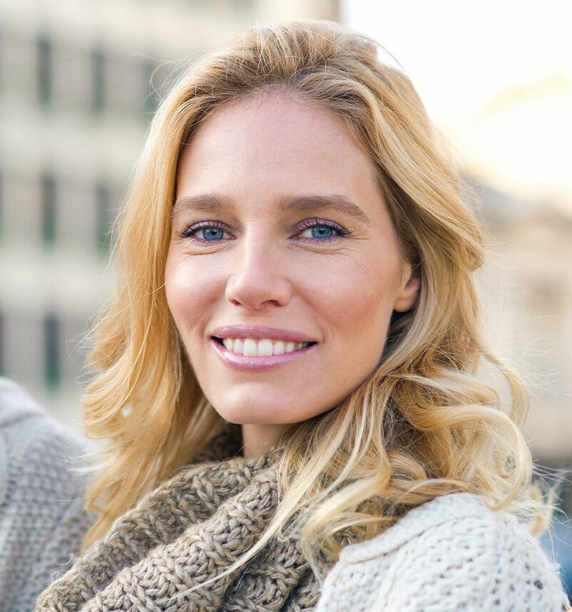 woman with blonde curly hair
