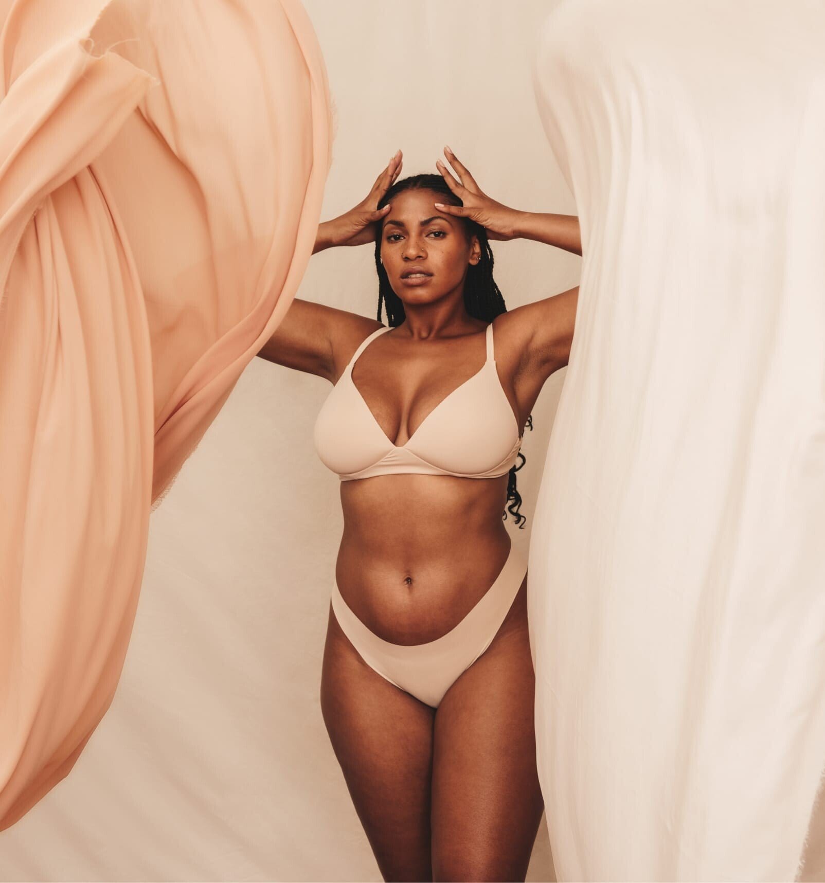 woman in nude undergarments