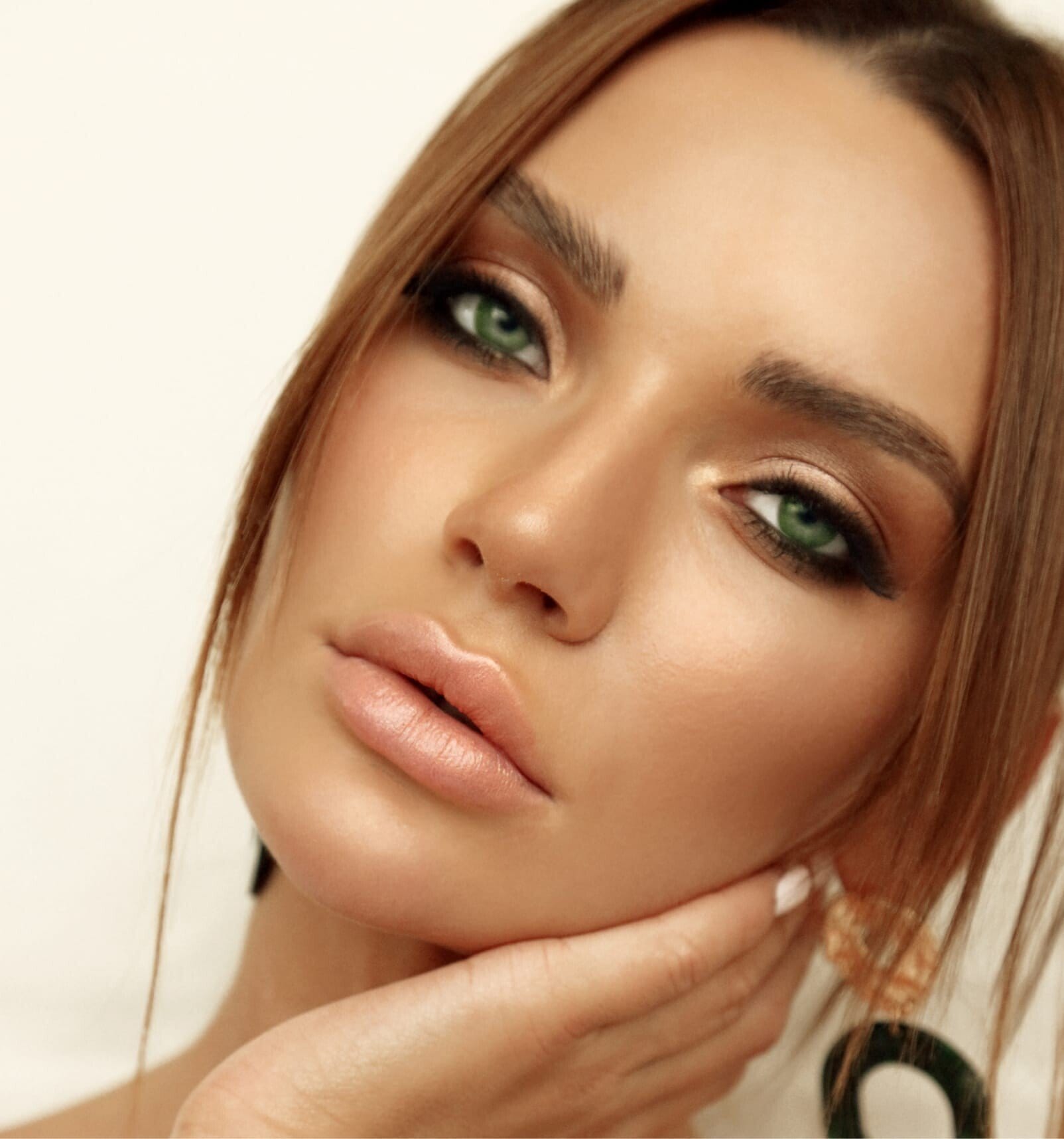 there is a woman with green eyes