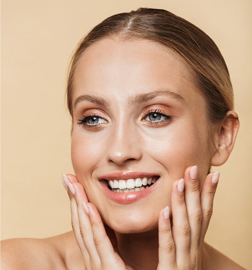 woman touching her face