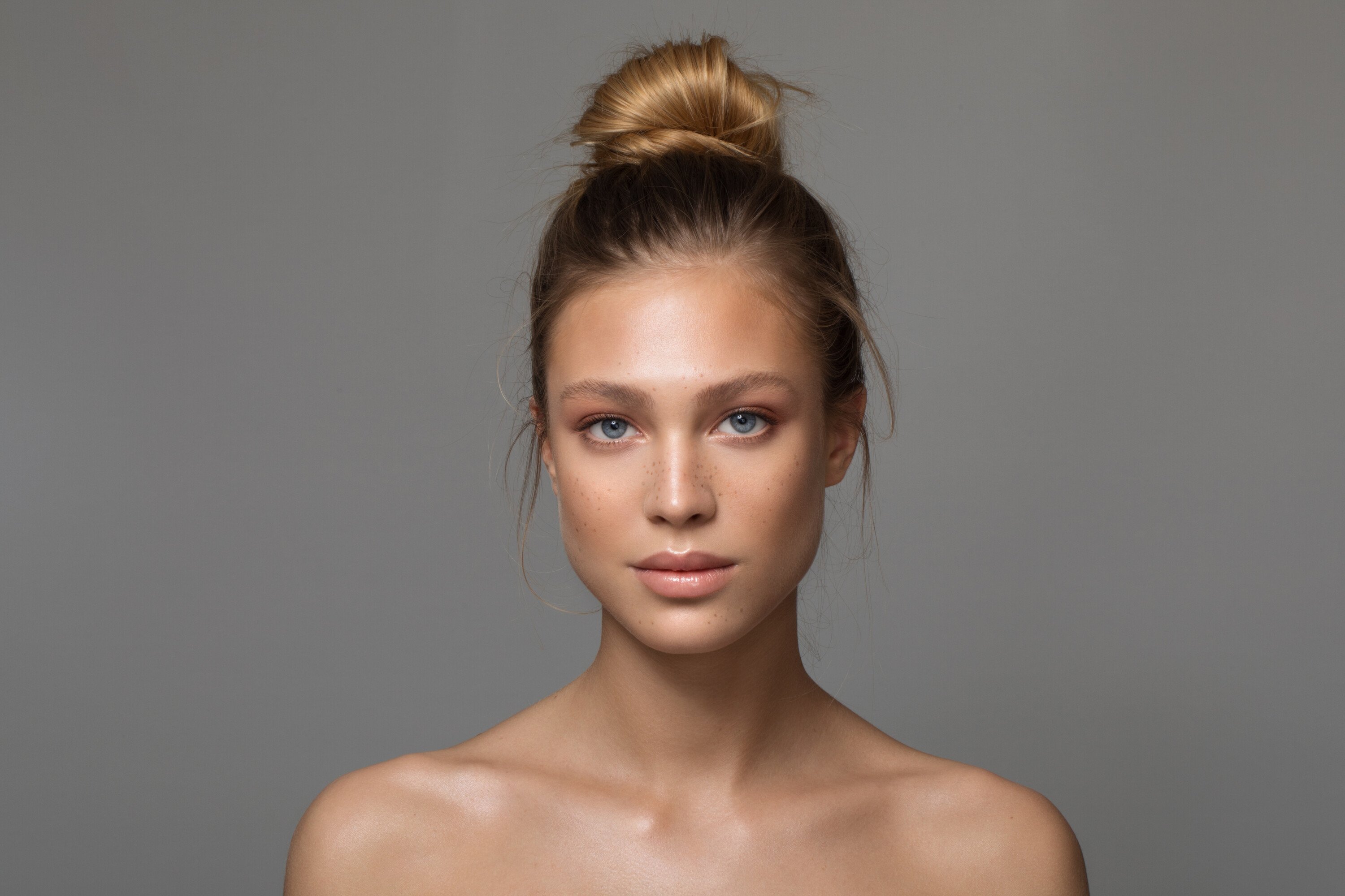 Woman with her hair in a bun