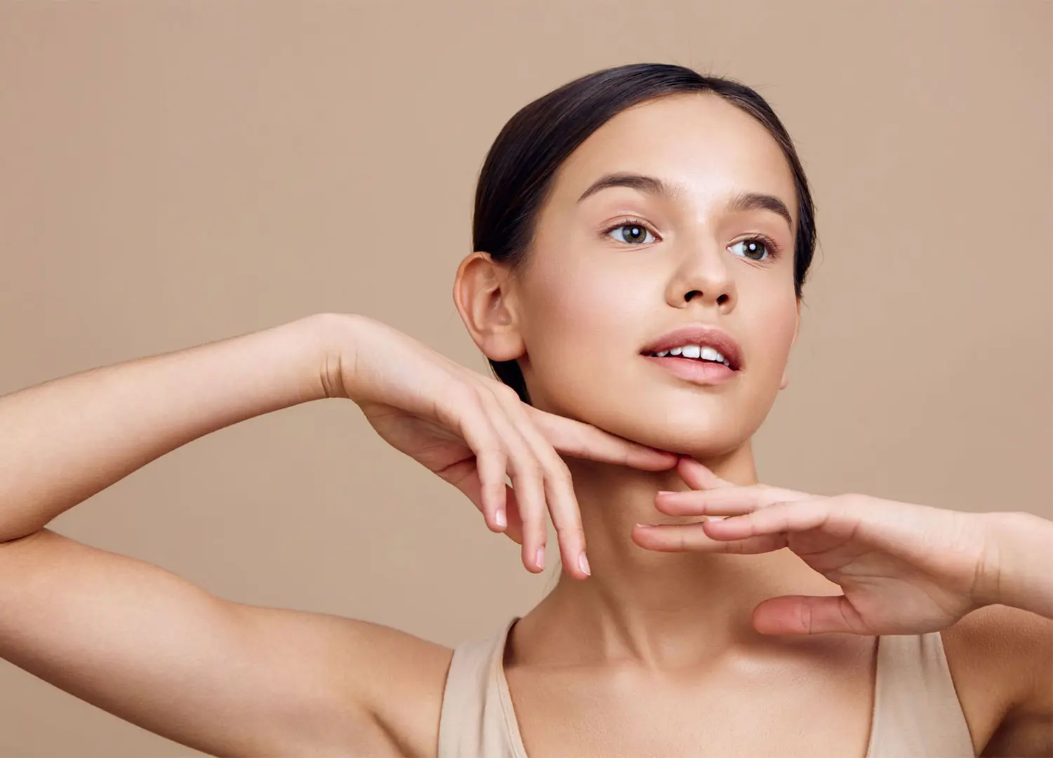 A young woman posing as a model with a natural look