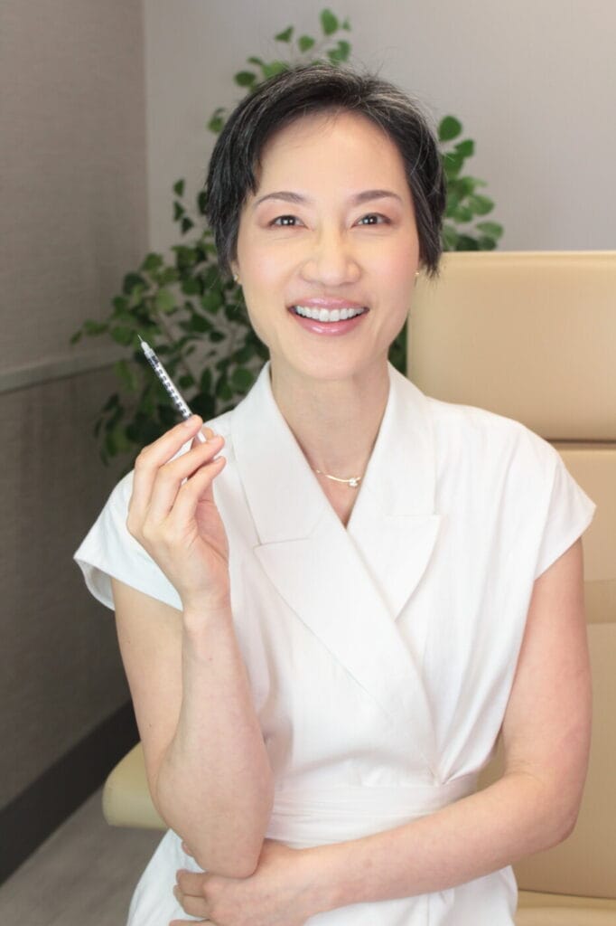 Dr. Melissa Chiang, board-certified dermatologist in Spring TX, providing summer-safe aesthetic consultations for The Woodlands community.